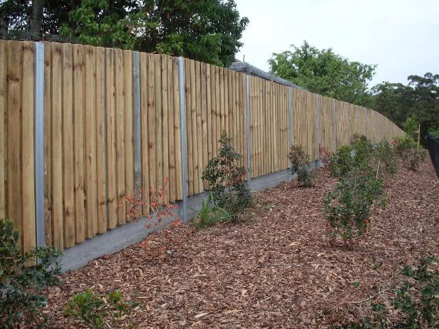 Acoustic Timber Lapped with Exposed Steel Posts and Concrete Base