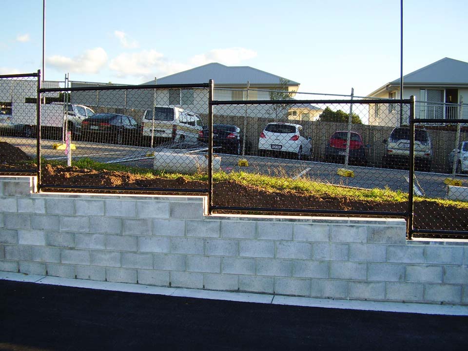 Black PVC on retaining wall