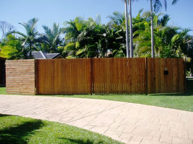 Paling Fence with Exposed Posts Oiled And Horizontal Pine Slat Gate