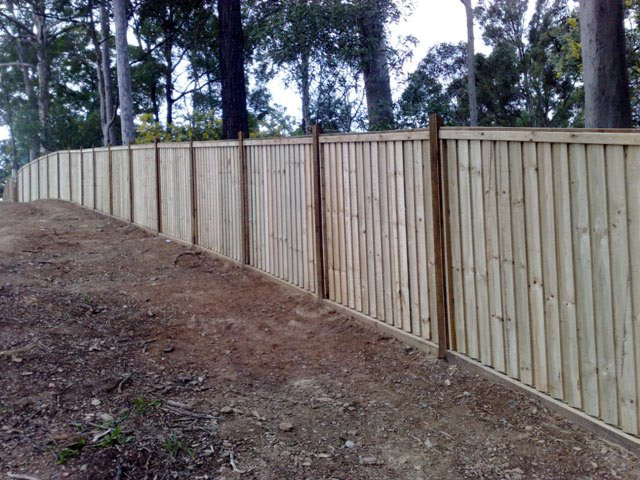 Pine Paling Fence Lapped Capped and Exposed Hardwood Posts with Sleeper Base