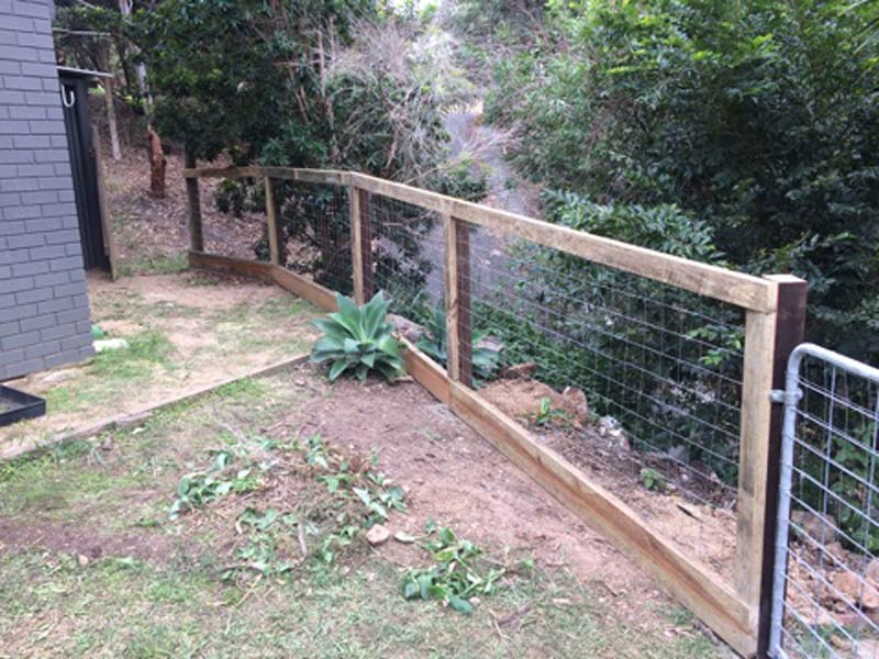 Dog Fence with top rail and sleeper